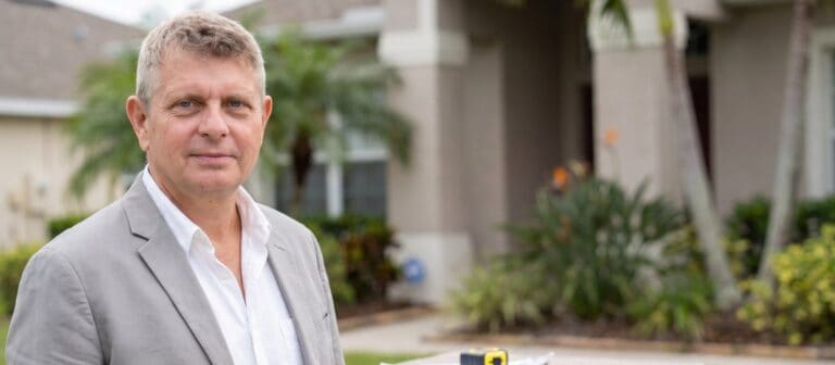 Axel Weiss, Broker at Sea to Sky Realty, assessing a home value in Bradenton, Florida